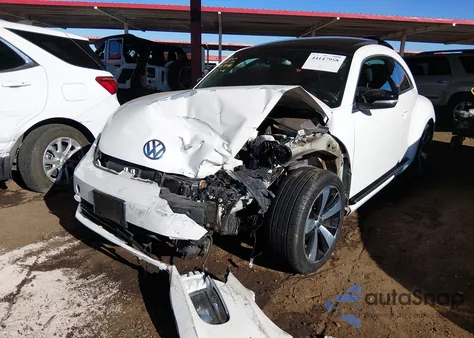 2012 Volkswagen Beetle 2.0T Turbo z USA, uszkodzony, nr VIN 3VWV67AT9CM650952